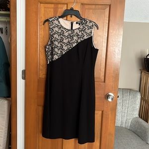 Elegant black dress, with detailed decorative top,Size 12. Worn once @ wedding